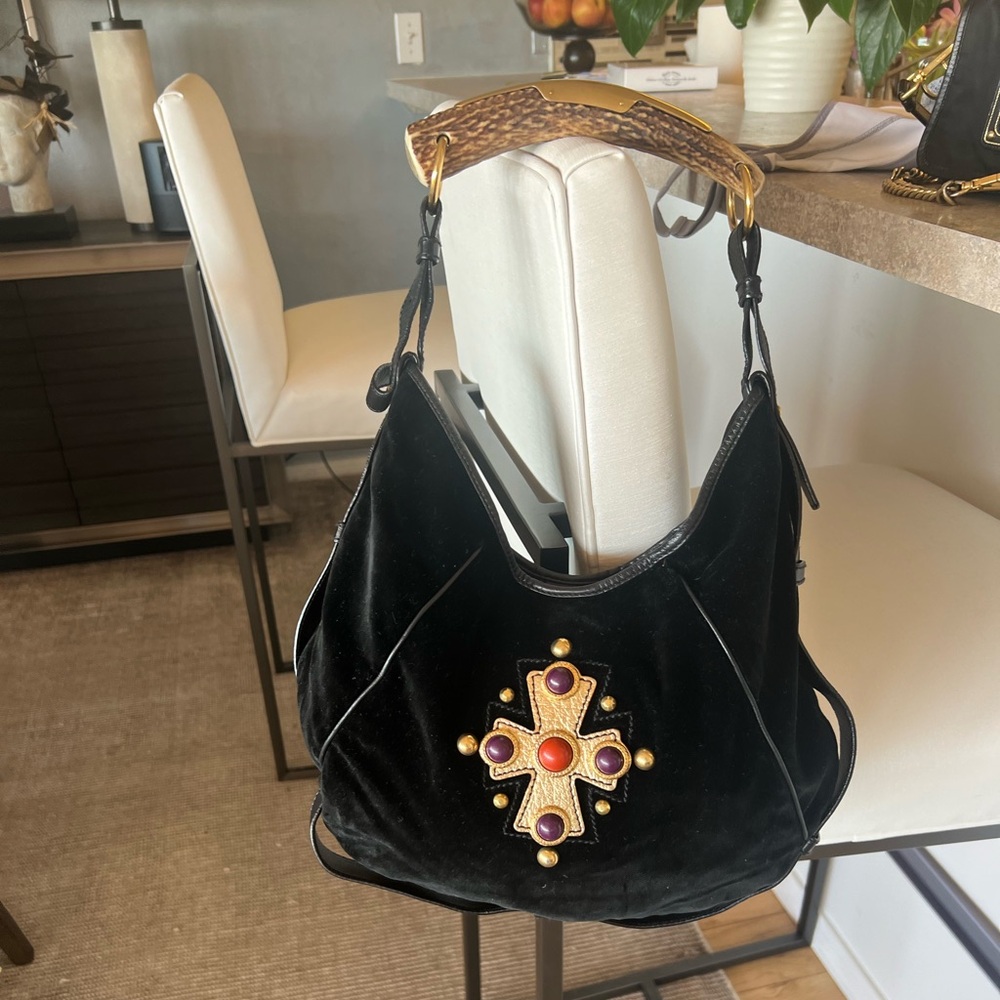 YSL beautiful black velvet purse barely use with bone handle and beautiful studs